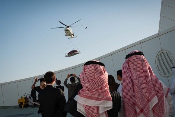 Aston Martin celebrates 100th Anniversary by air lifting a Vanquish to the helipad at the Burj Al Arab hotel in Dubai