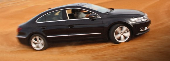 Volkswagen CC driven in the desert on sand in UAE
