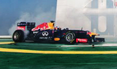Infiniti Red Bull F1 car doing donuts on Burj Al Arab helipad in Dubai, UAE