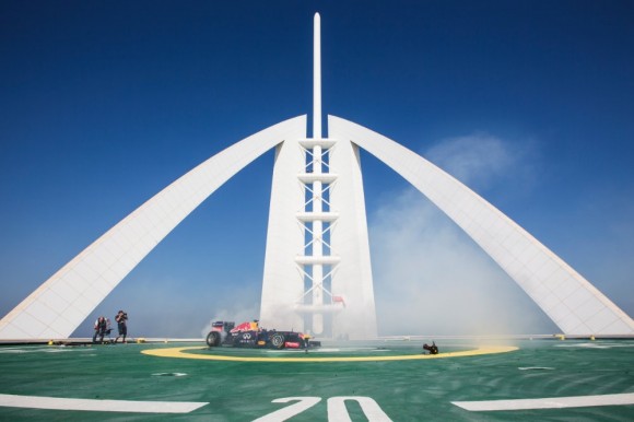 Infiniti Red Bull F1 car doing donuts on Burj Al Arab helipad in Dubai, UAE
